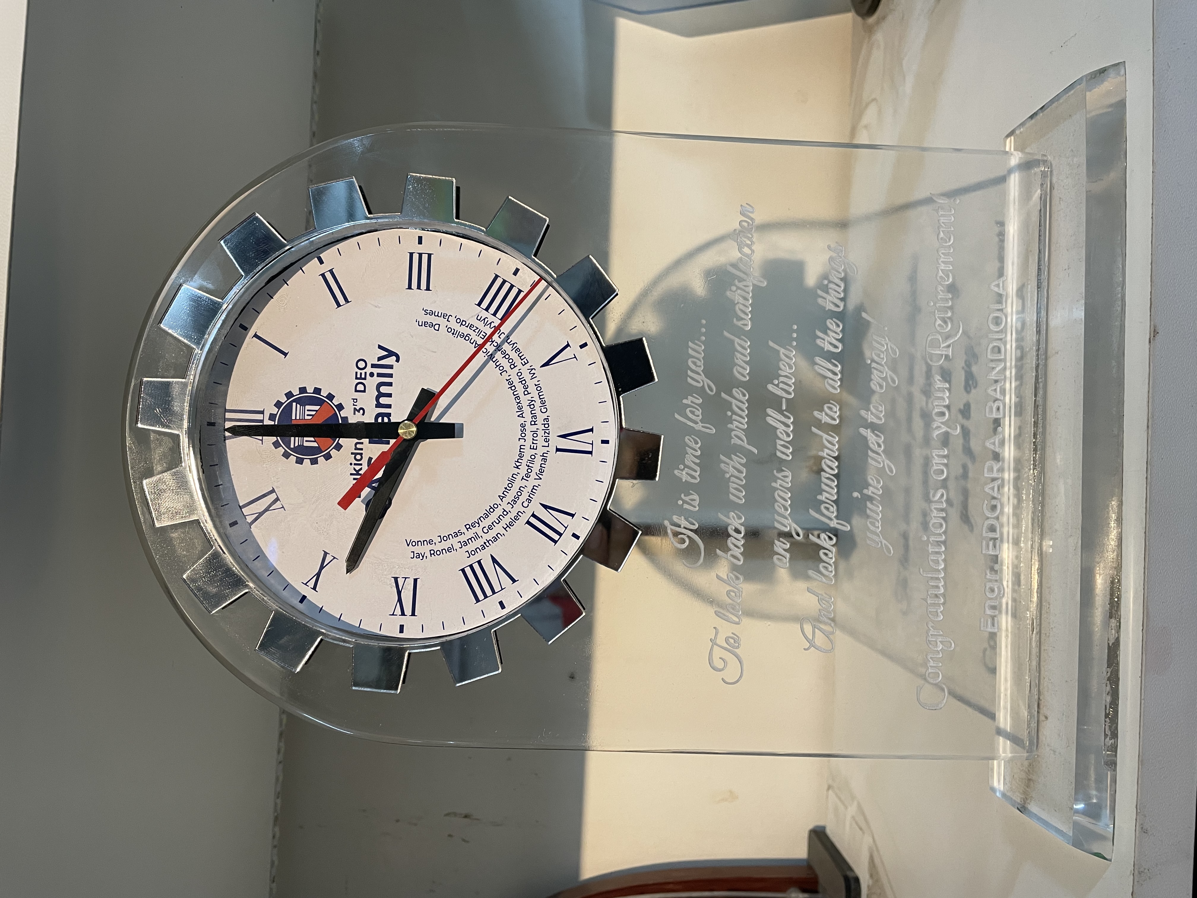 Glass plaque with clock