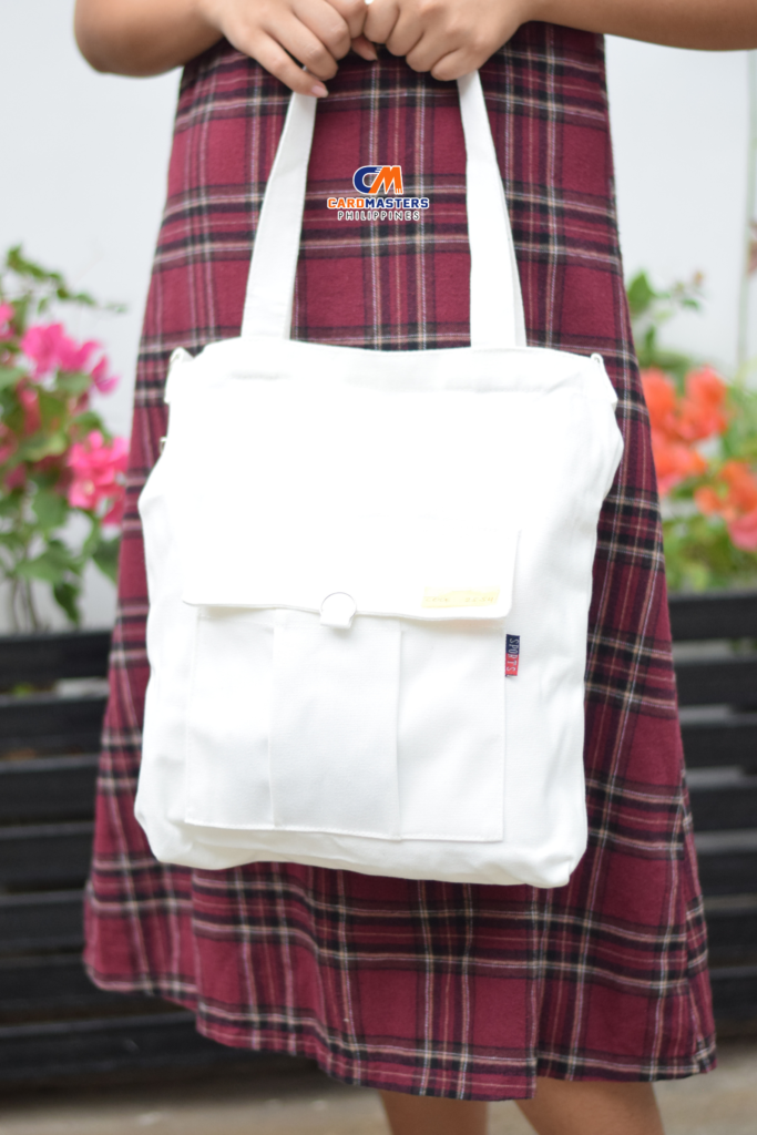 white-tote-bag-held